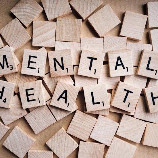 Scrabble letters that spell 'mental health'