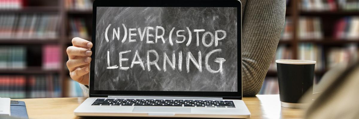 Computer destop with the text: Never stop learning