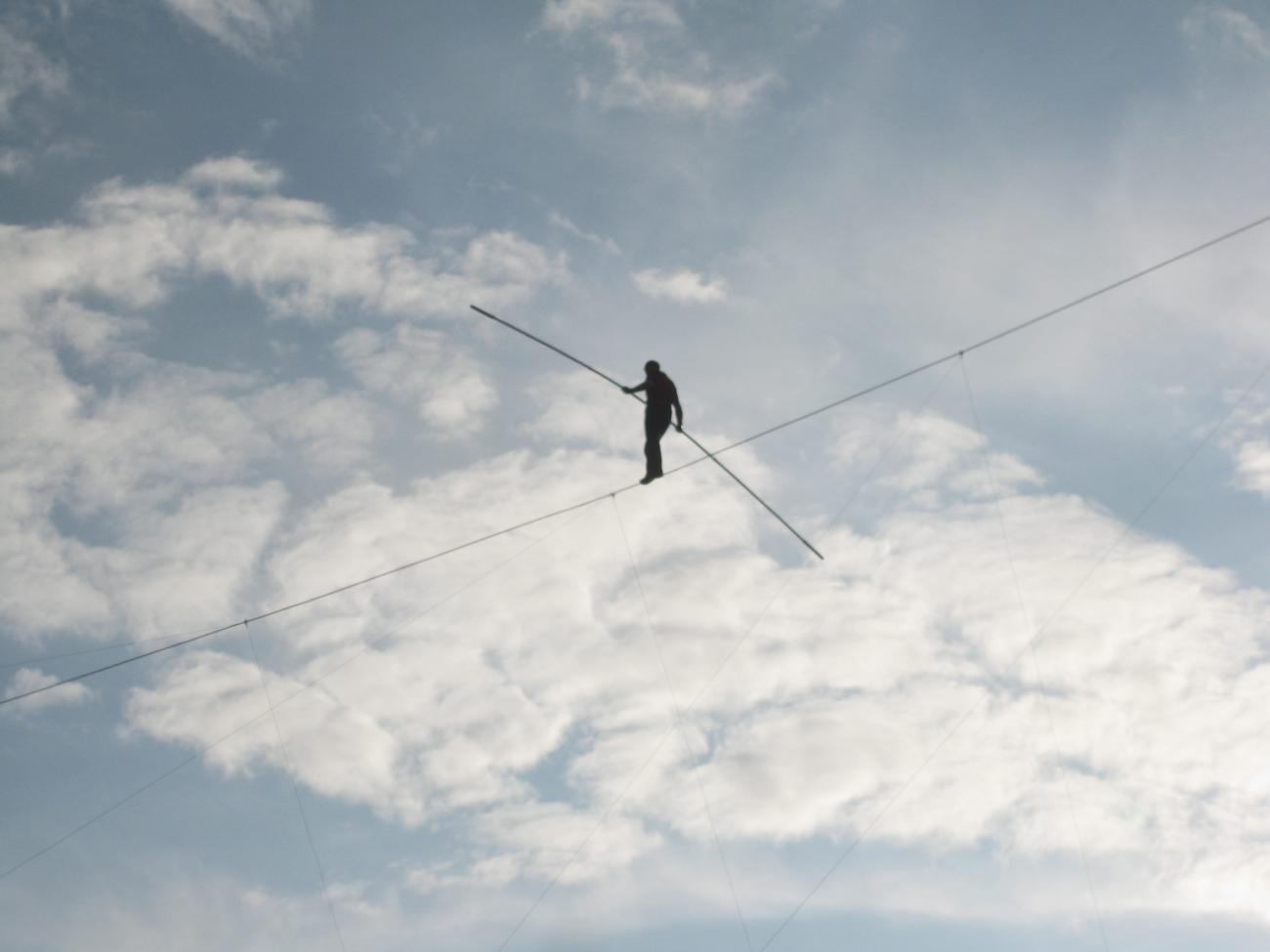 Person on tightrope