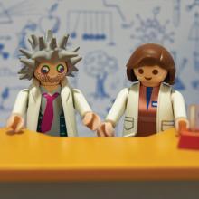 Toy scientists in fake lab