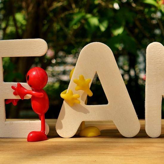 Wooden blocks spelling 'team'