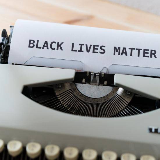Image of 'Black Lives Matter' typed on paper by Markus Winkler from Pixabay