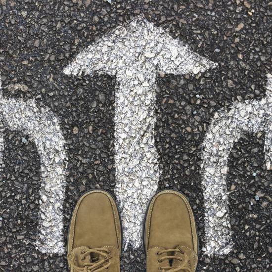 Image of painted directions on a road by Gerd Altmann from Pixabay