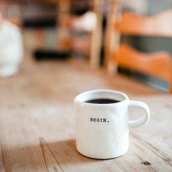 Photo of mug on a table  by Danielle MacInnes on Unsplash