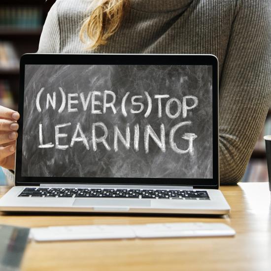 Computer destop with the text: Never stop learning