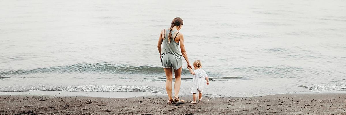 Mother and child at beach