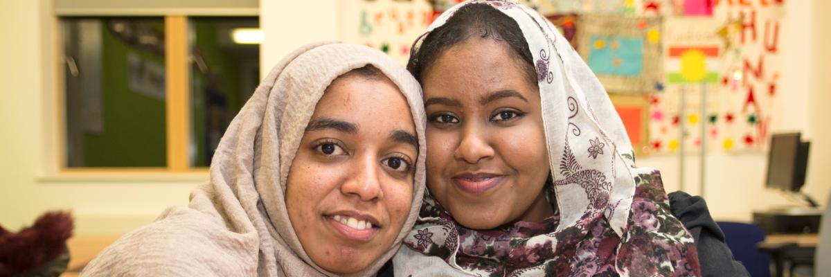 Two women smiling