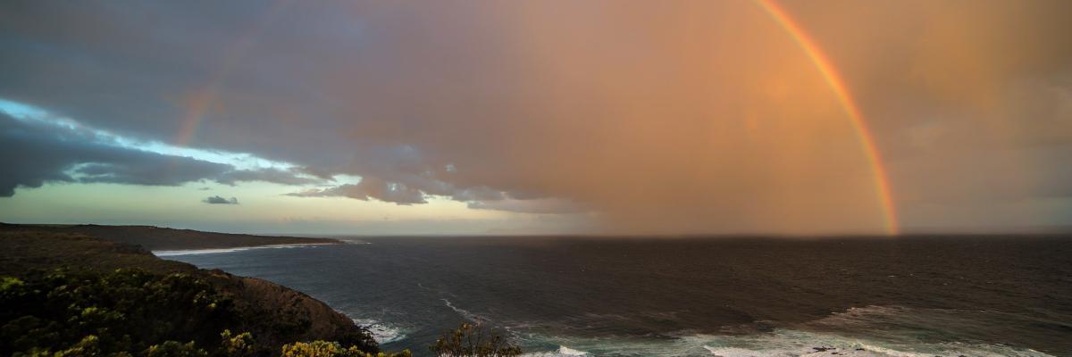 Image of a rainbow over seascape