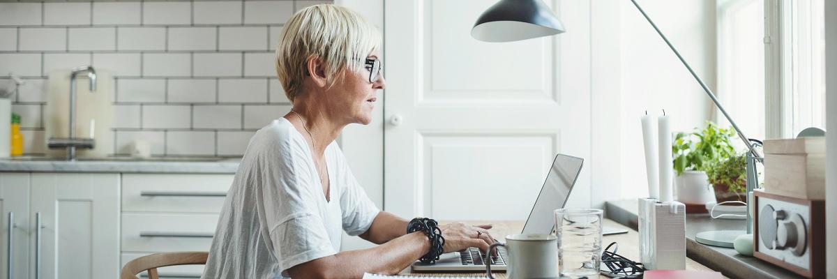 Home worker at kitchen table