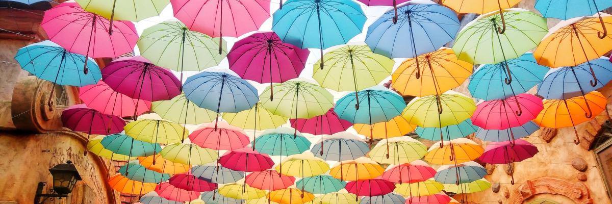 a canopy of coloured umbrellas