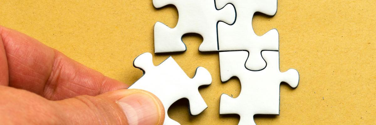 Jigsaw pieces fitting together