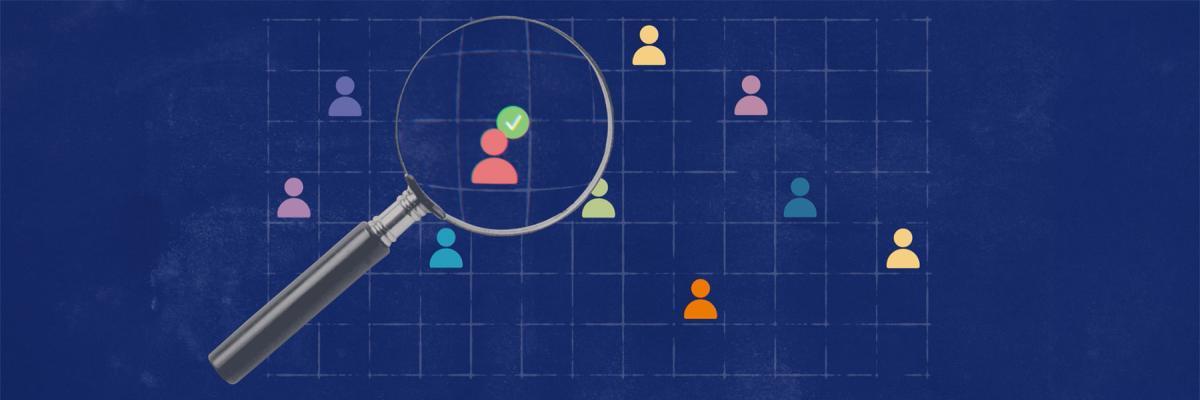 Group of colourful figures being inspected by a giant magnifier