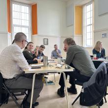 group sitting together in a workshop