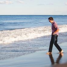 father and son on beach