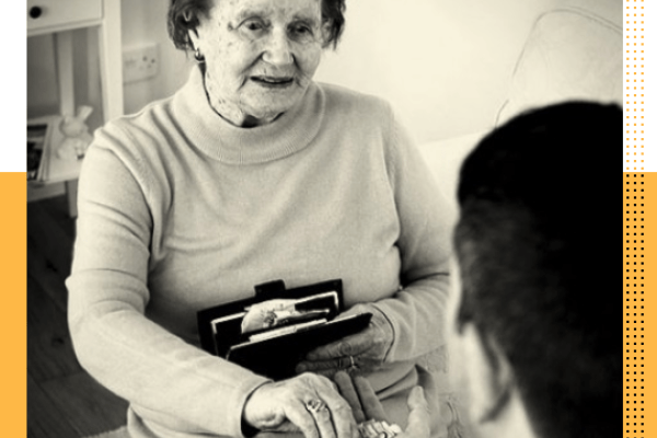 Image of older woman giving money to unknown person
