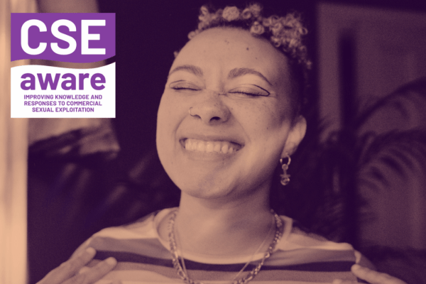 Smiling woman from cover of report
