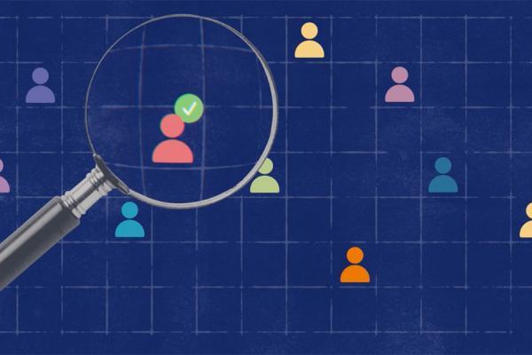 Group of colourful figures being inspected by a giant magnifier